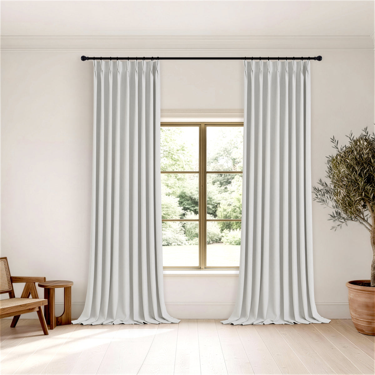 Ottilie Plush Chenille Blackout Curtains in Chalk, hanging in a room