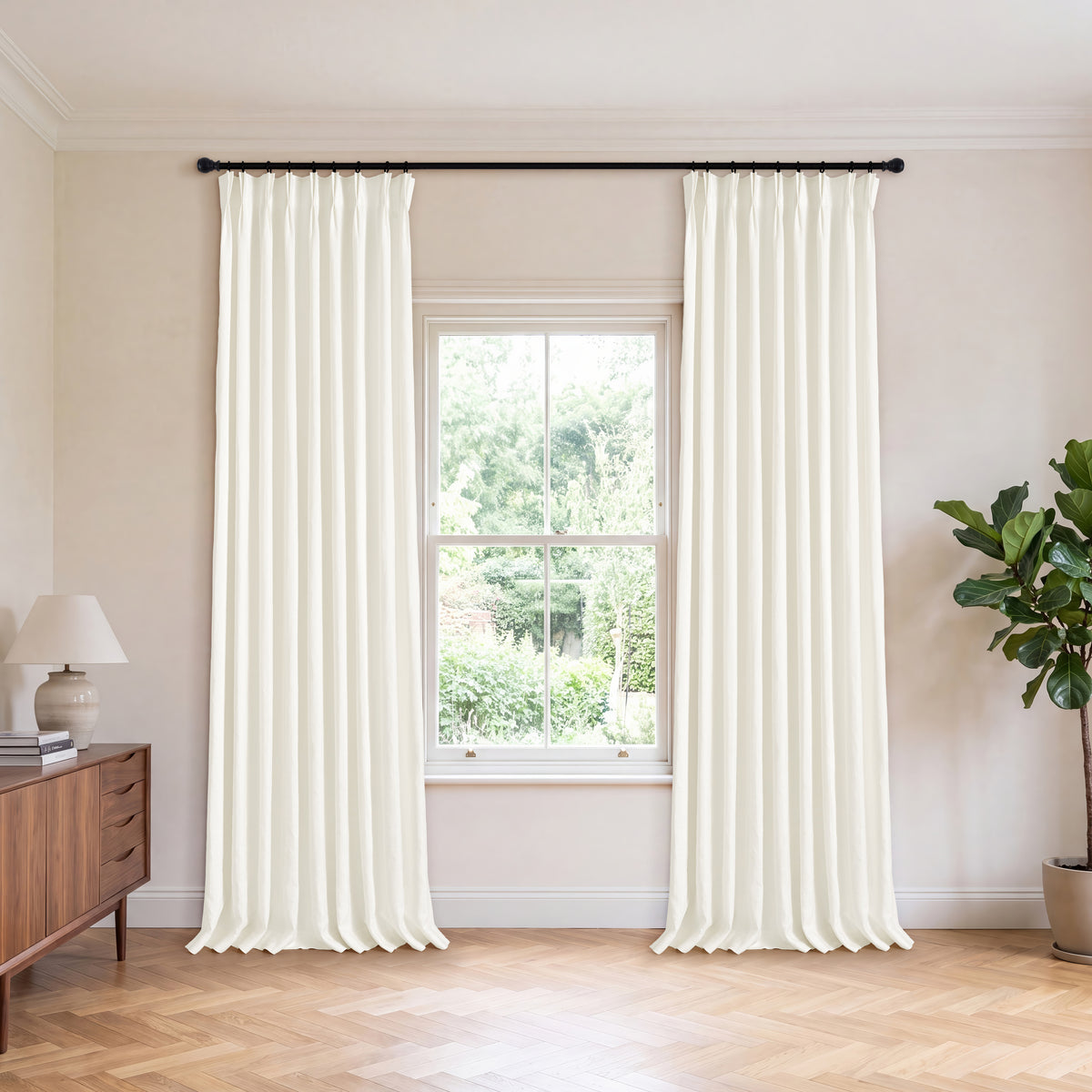 Ainsley Pure Linen Curtains in Ivory, hanging in a room