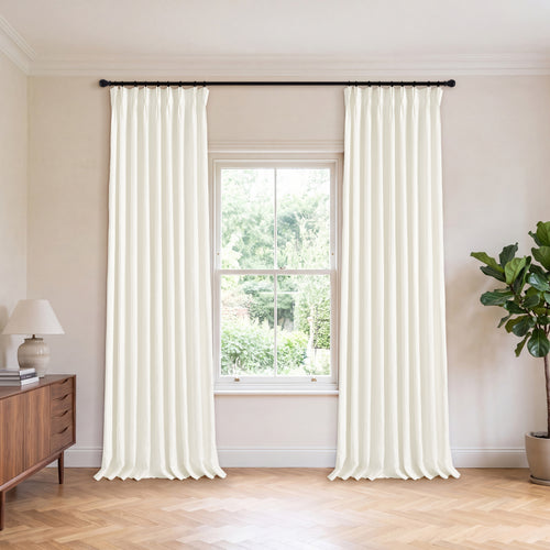 Ainsley Pure Linen Curtains in Ivory, hanging in a room