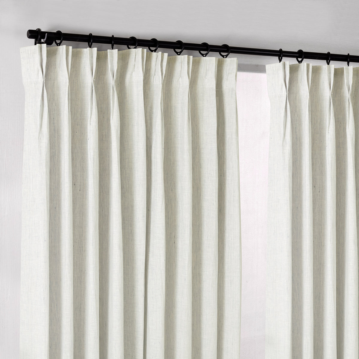 Rafe Slubbed Pure Linen Curtains in Chalk, hanging at the window