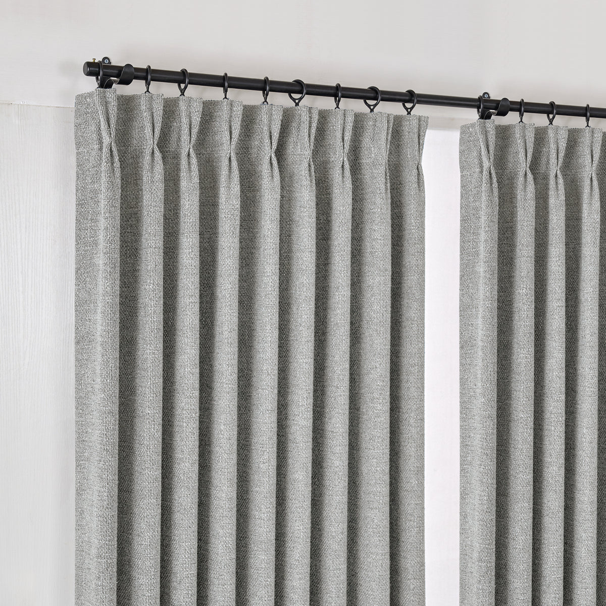 Kendall Basketweave Blackout Curtains in Pewter, hanging at the window