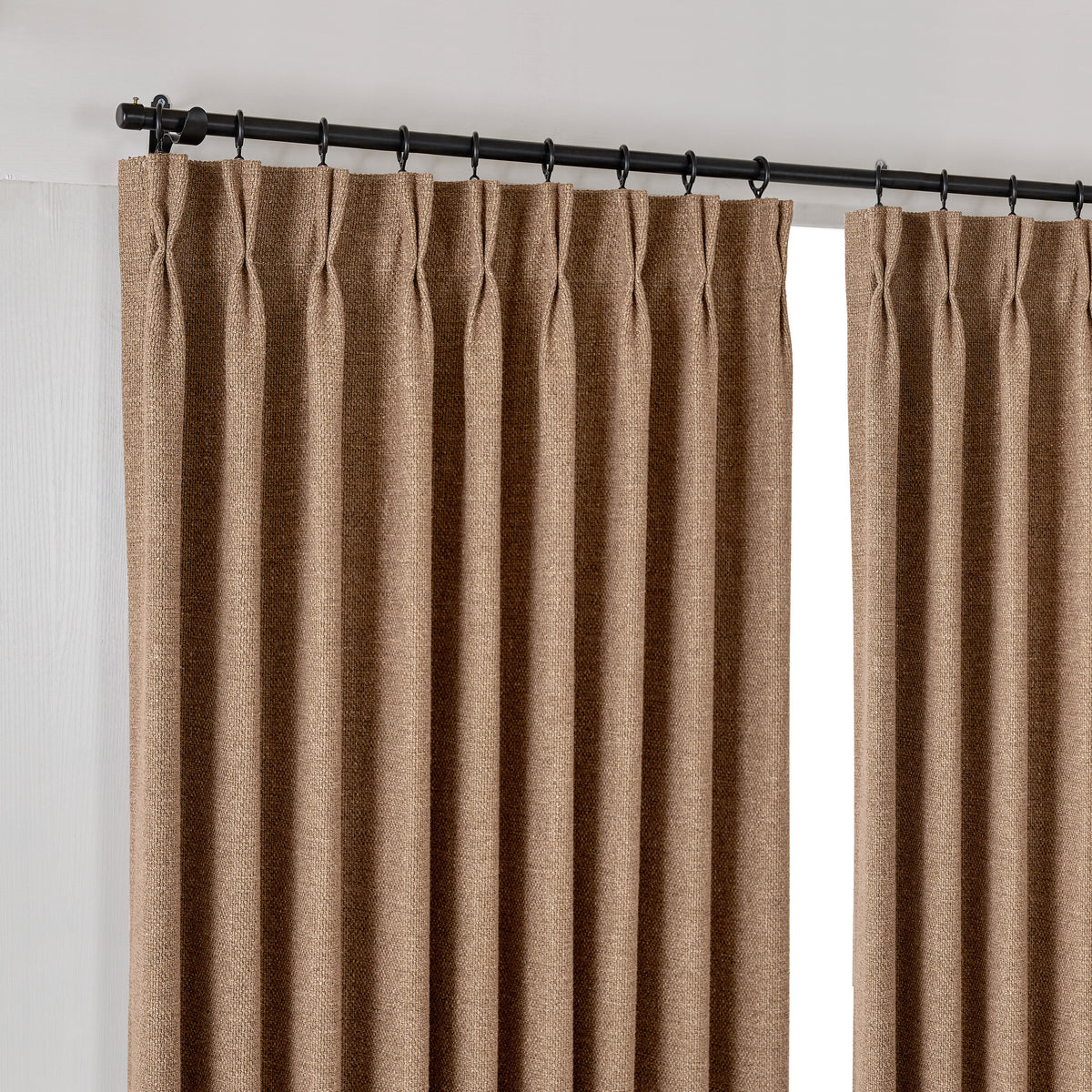 Kendall Basketweave Blackout Curtains in Pale Cocoa, hanging at the window