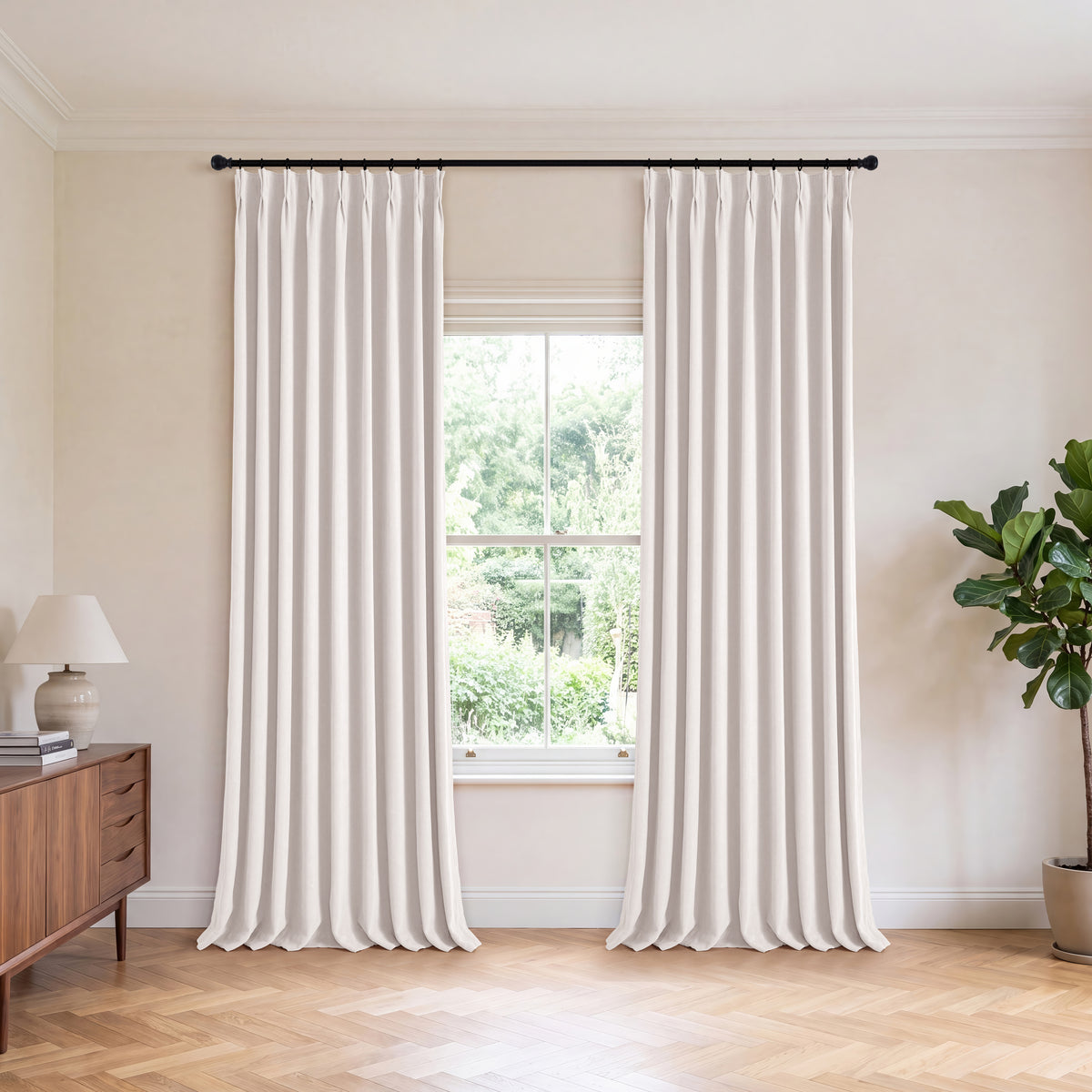 Genevieve Cloud-Soft Chenille Blackout Curtains in Cool Greige, hanging in a room