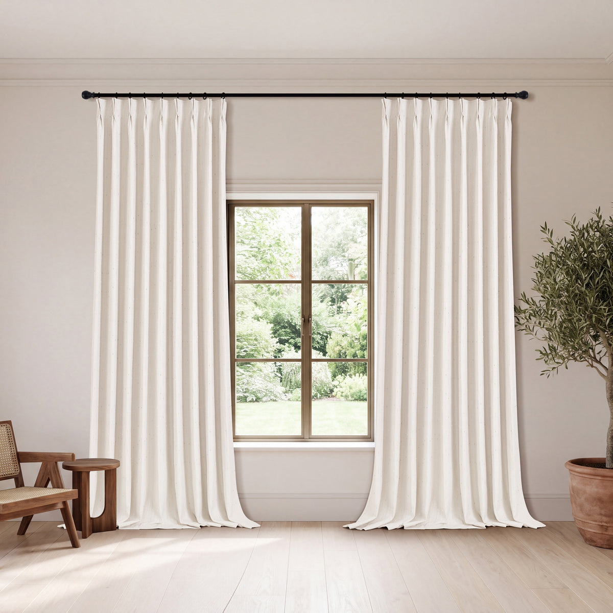 Clarice Tonal Jacquard Blackout Curtains in Light Pink, hanging in a room