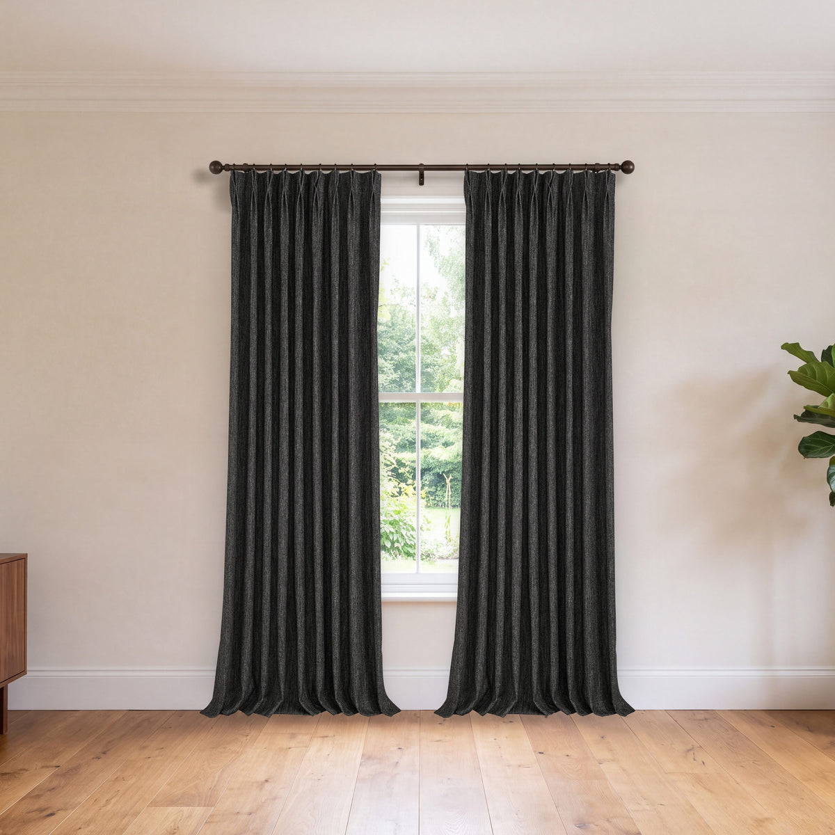 Laurence Heathered Weave Curtains in Charcoal, hanging in a room