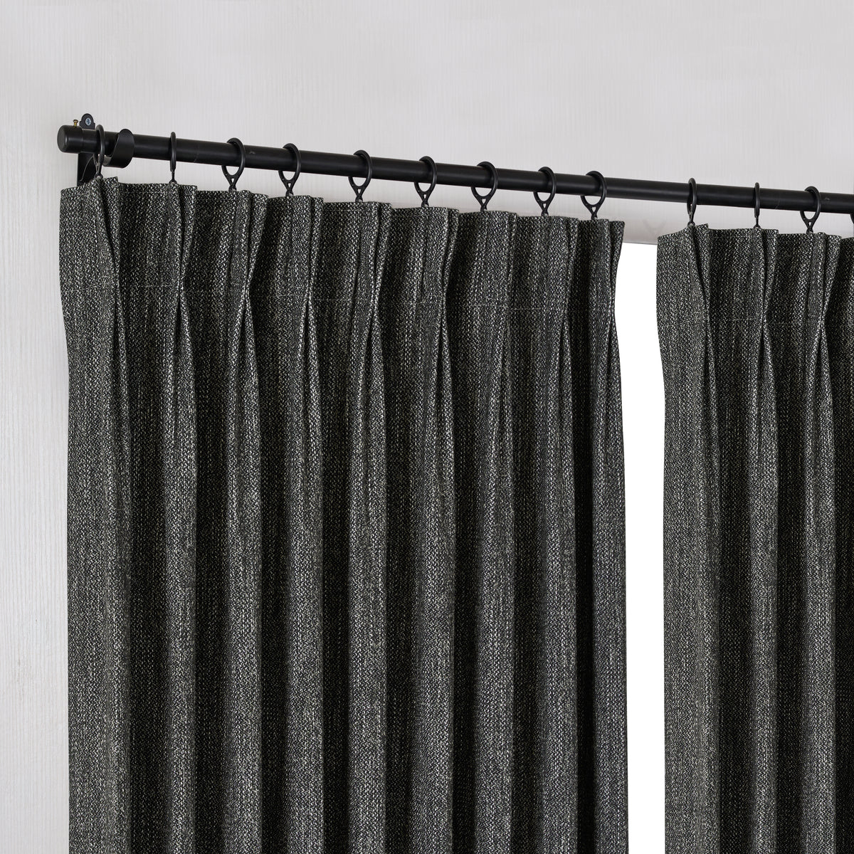 Laurence Heathered Weave Curtains in Charcoal, hanging at the window