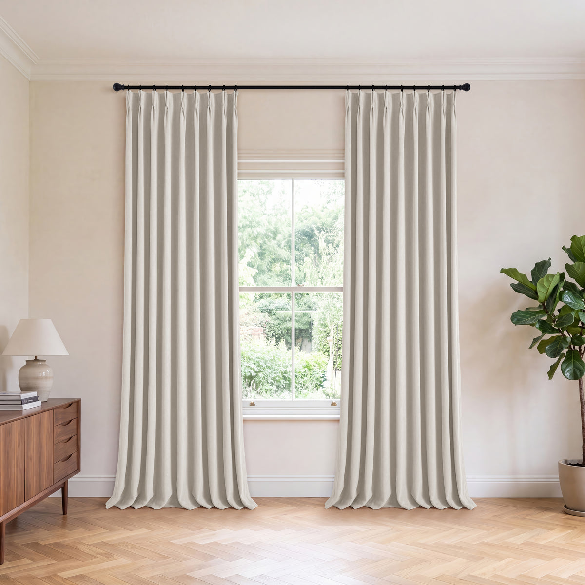 Genevieve Cloud-Soft Chenille Blackout Curtains in Greige, hanging in a room