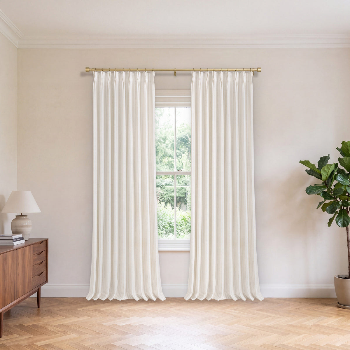 Fenimore Feather Stripe Weave Curtains in Natural, hanging in a room