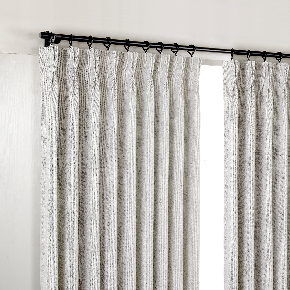 Pembroke Rib Weave Curtains in Cool Chalk, hanging at the window
