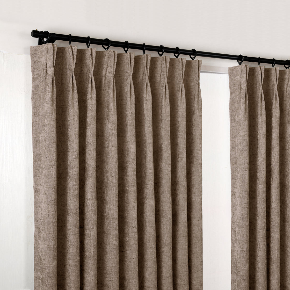 Prentiss Reversible Slub Curtains in Cocoa, hanging at the window