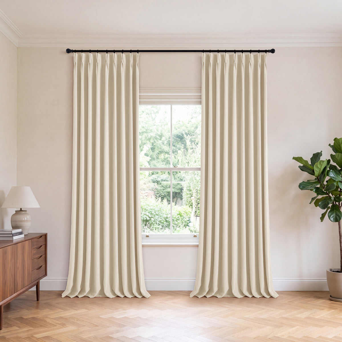Genevieve Cloud-Soft Chenille Blackout Curtains in Flax, hanging in a room