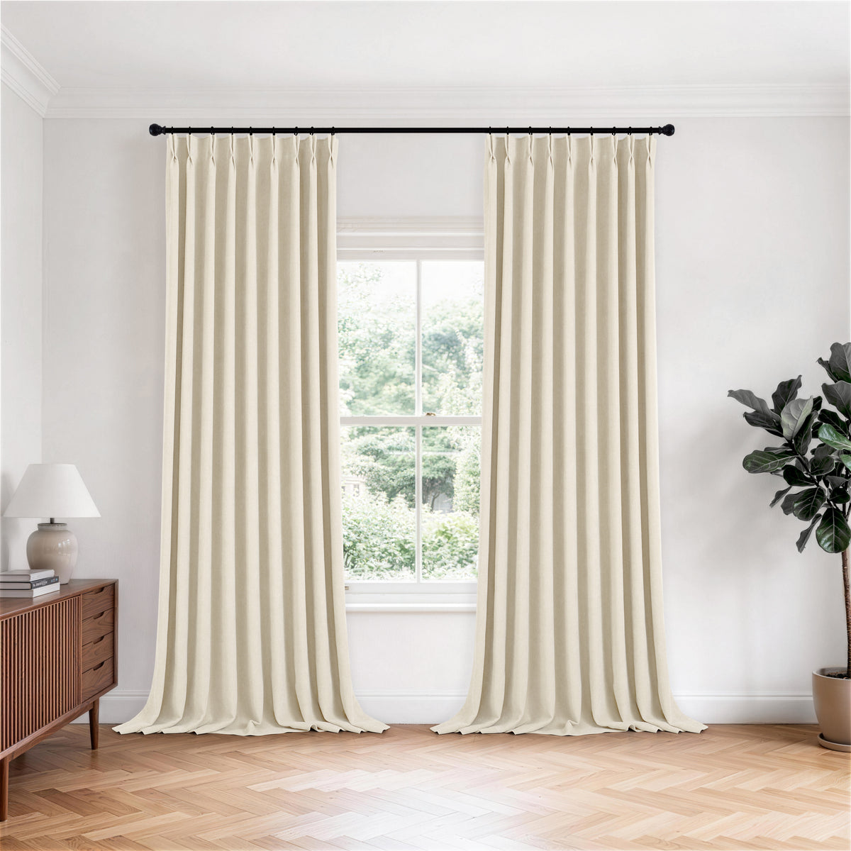 Hadleigh Herringbone Blackout Curtains in Ivory, hanging in a room