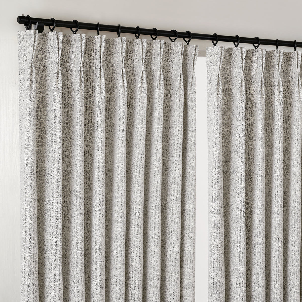 Pembroke Flecked Weave Curtains in Soft Greige, hanging at the window