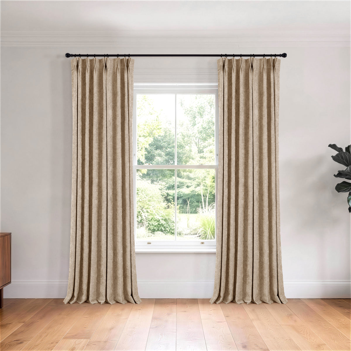 Prentiss Reversible Slub Curtains in Stone, hanging in a room
