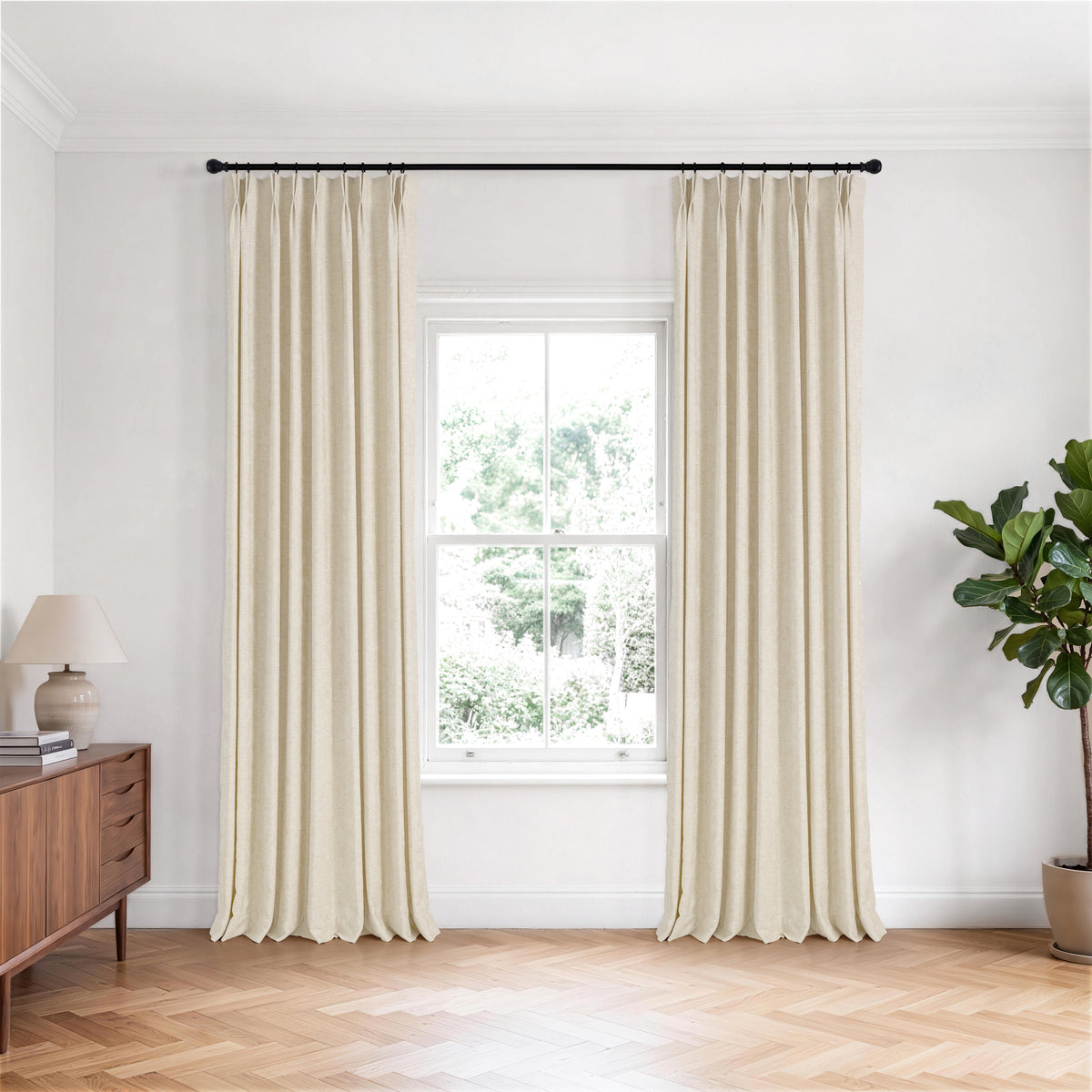 Prentiss Reversible Slub Curtains in Oat, hanging in a room