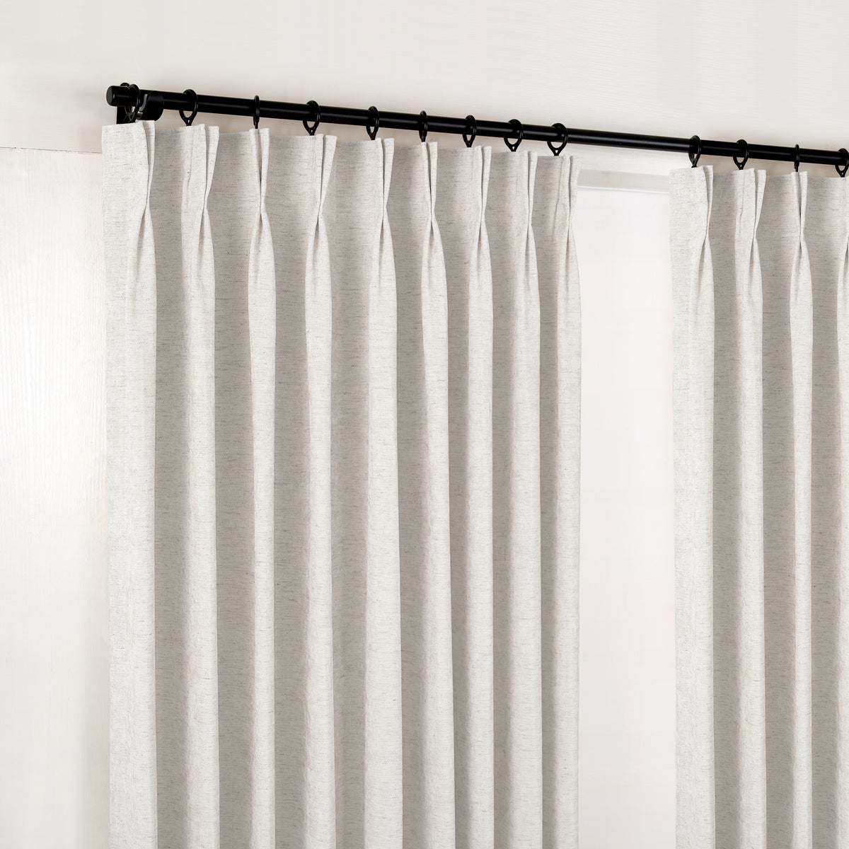 Prentiss Reversible Slub Curtains in Pale Greige, hanging at the window
