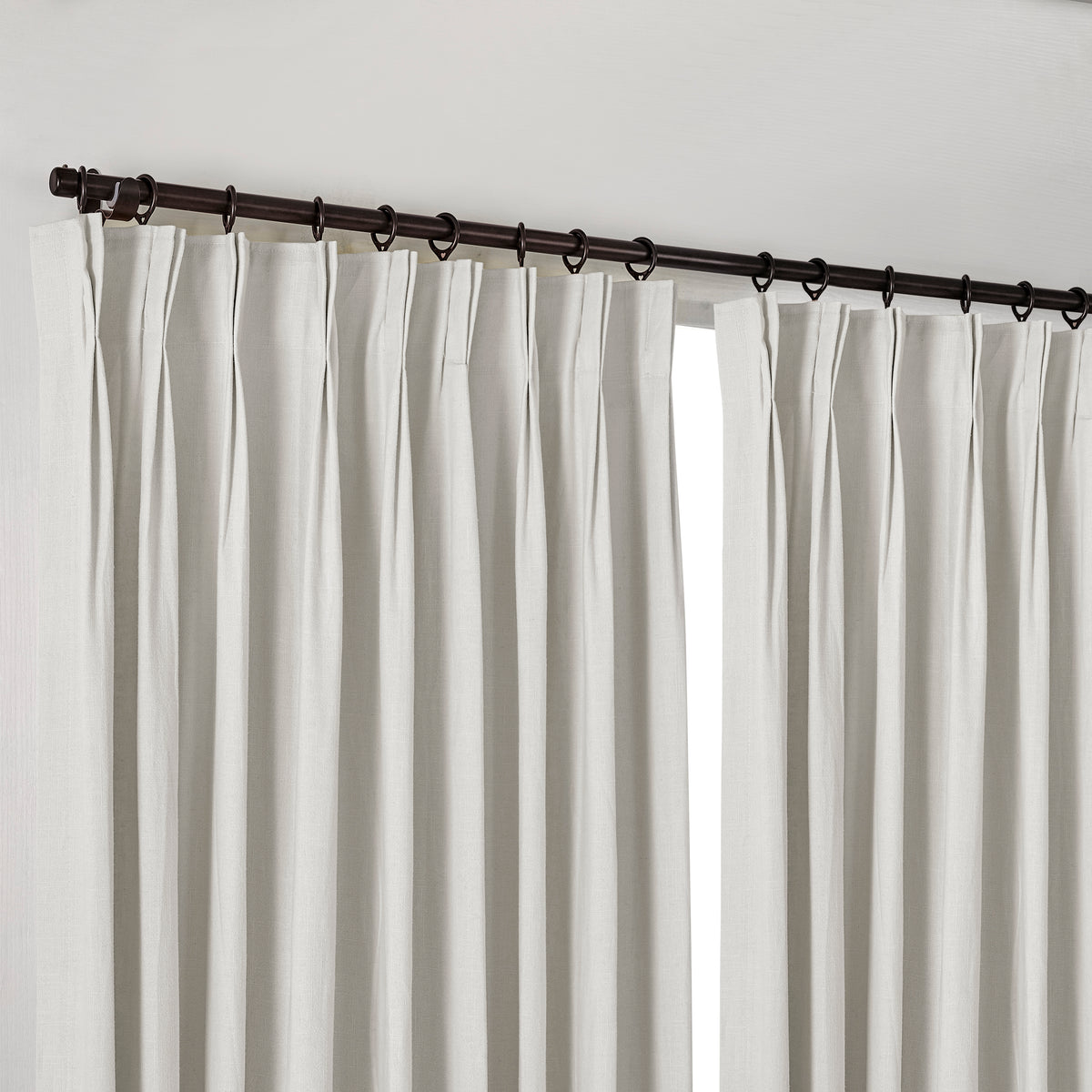 Edwina Linen-Cotton Curtains in Sage Gray, hanging at the window