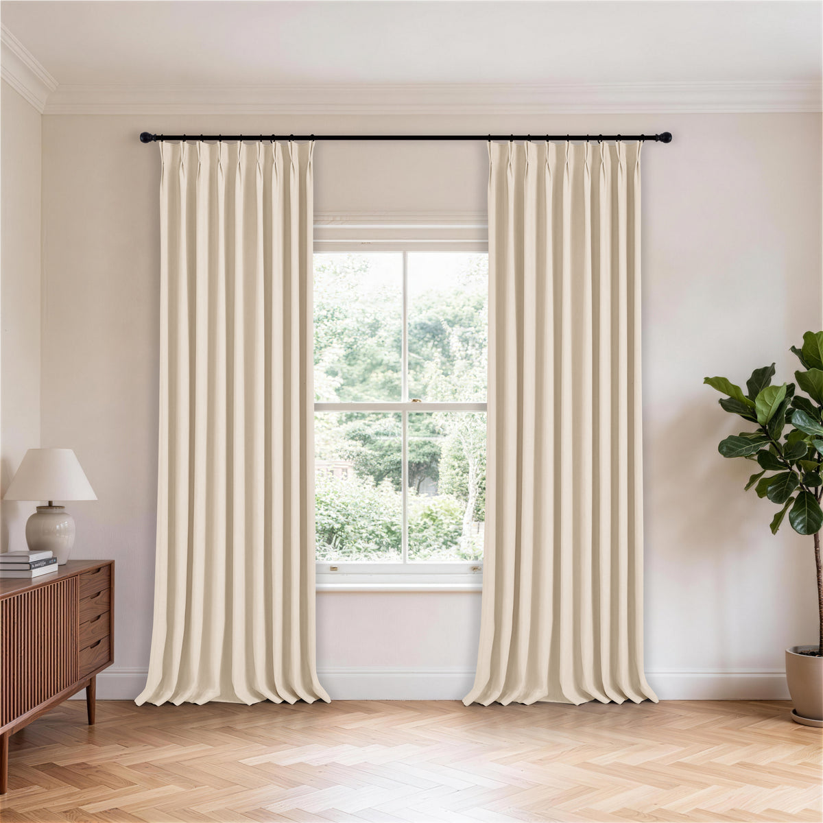 Ingram Brushed Weave Blackout Curtains in Oat, hanging in a room