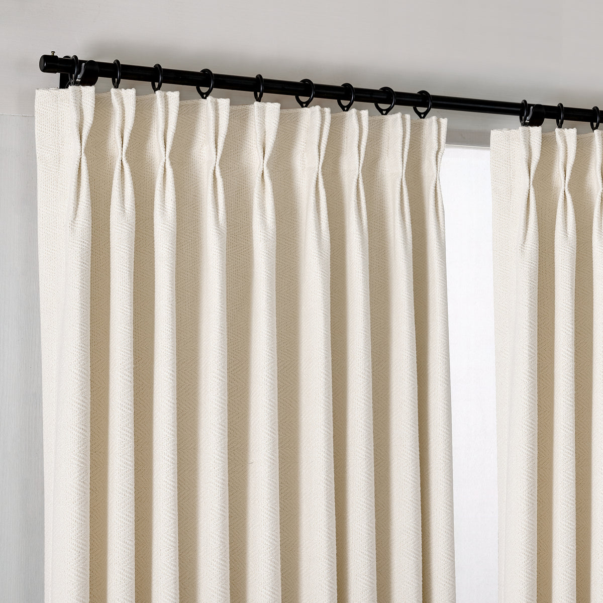Pembroke Herringbone Weave Curtains in Chalk, hanging at the window
