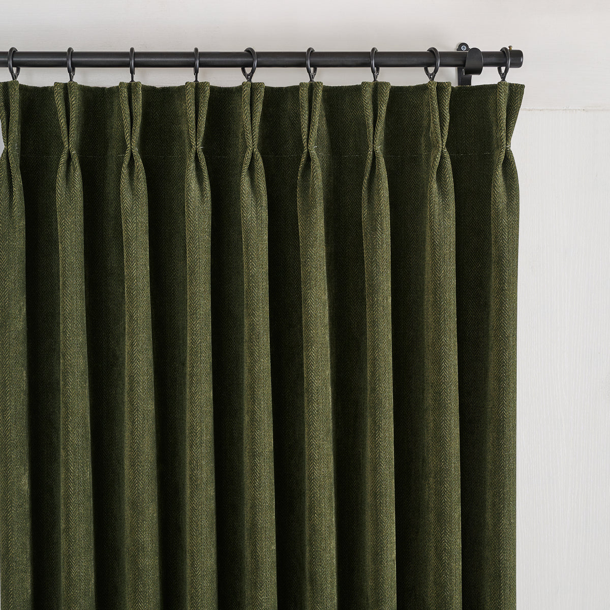 Hadleigh Herringbone Blackout Curtains in Forest, pleated header close up