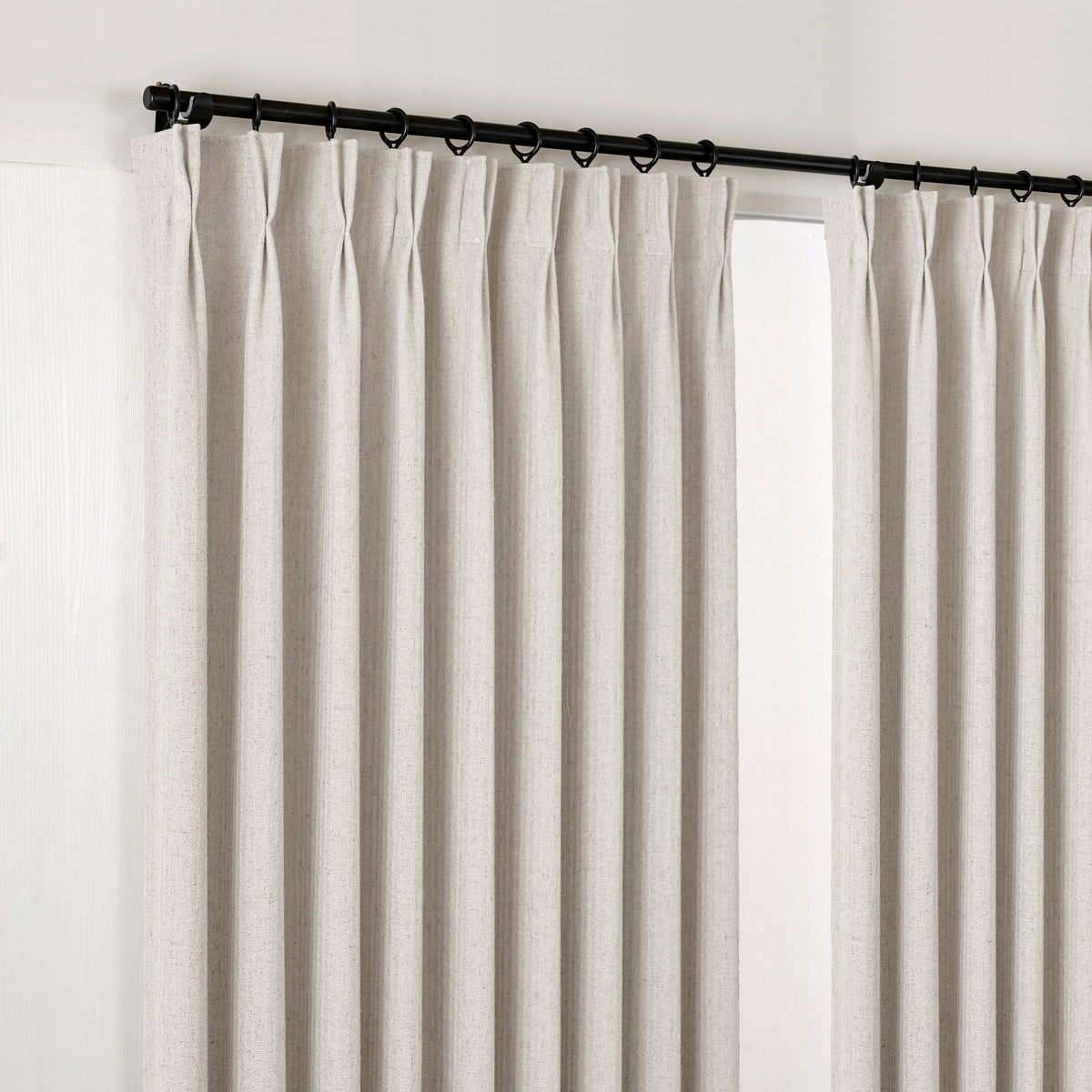 Ansel Slub Weave Curtains in Soft Greige, hanging at the window