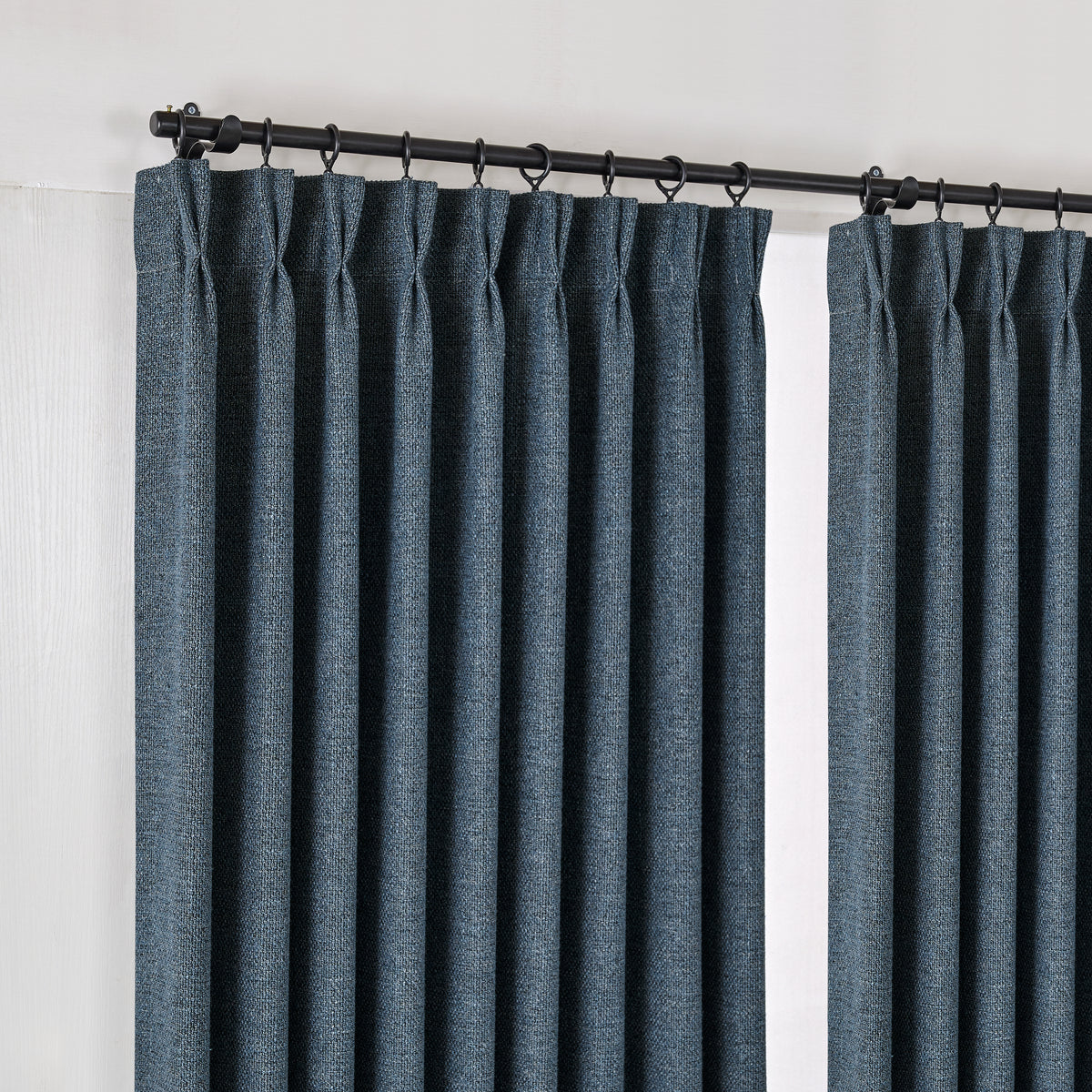 Kendall Basketweave Blackout Curtains in Navy, hanging at the window
