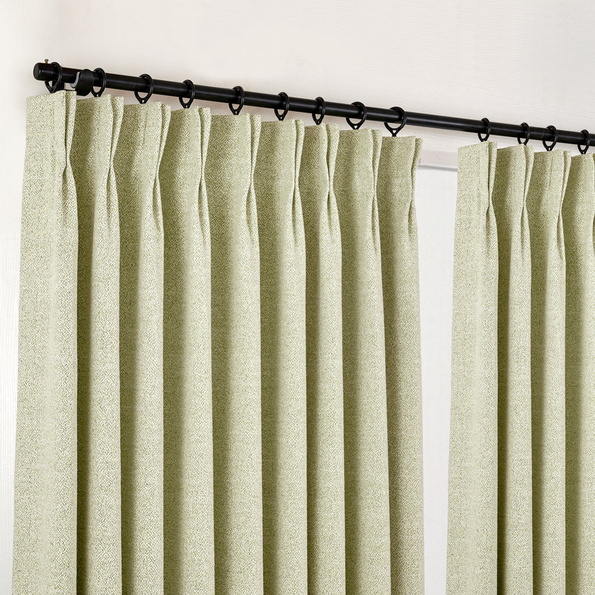 Pembroke Flecked Weave Curtains in Olive, hanging at the window