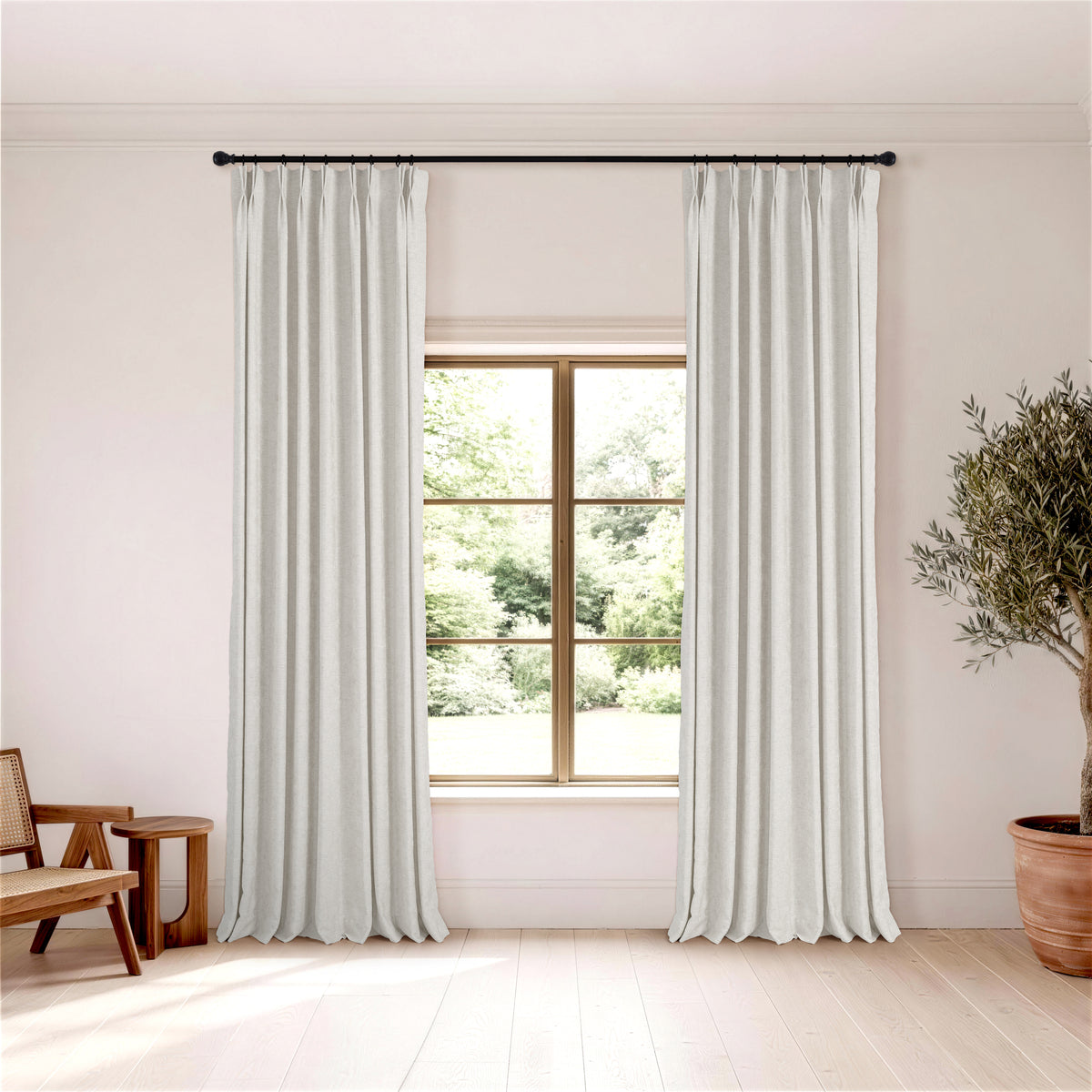 Prentiss Reversible Slub Curtains in Pale Greige, hanging in a room