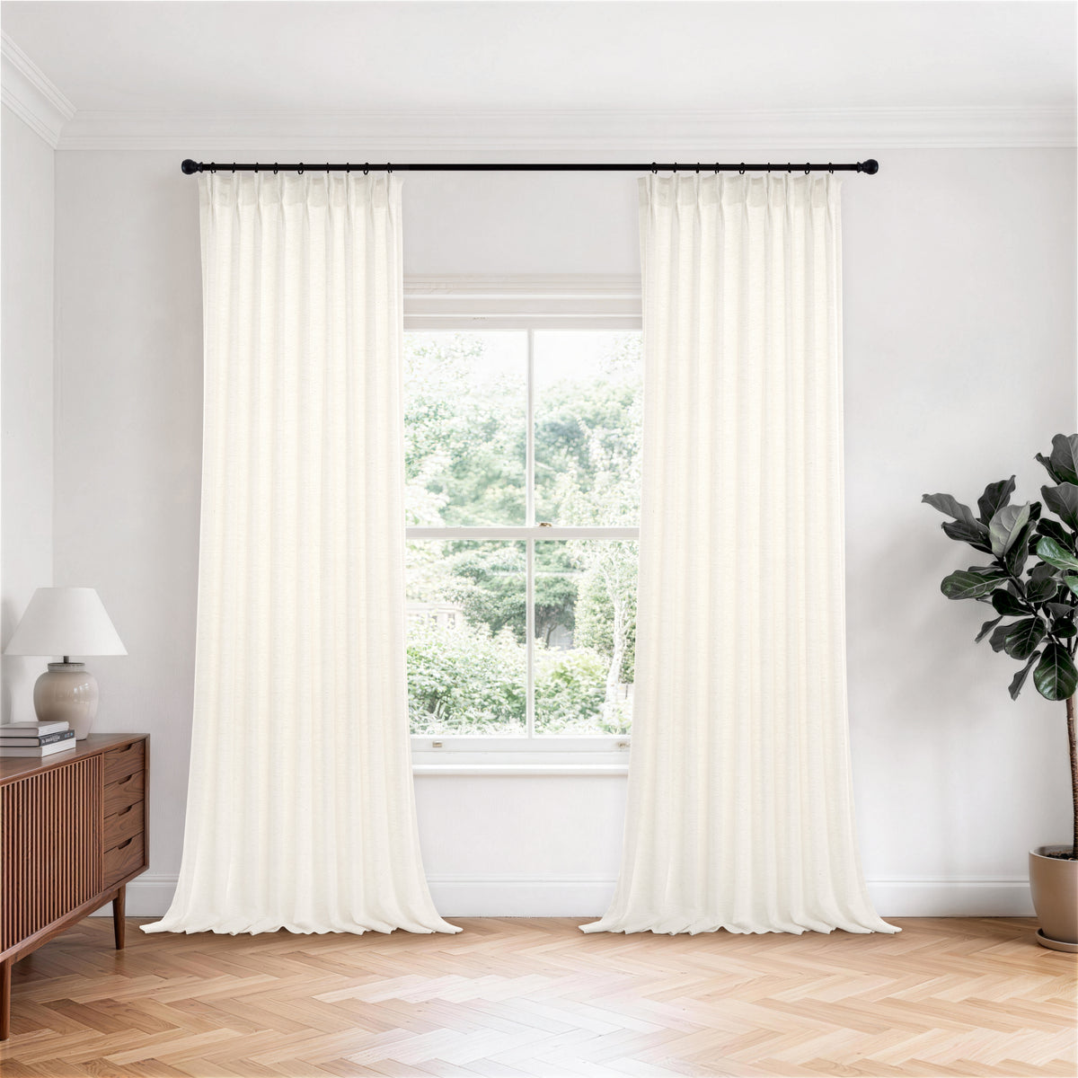 Lockwood Houndstooth Weave Curtains in Greige, hanging in a room