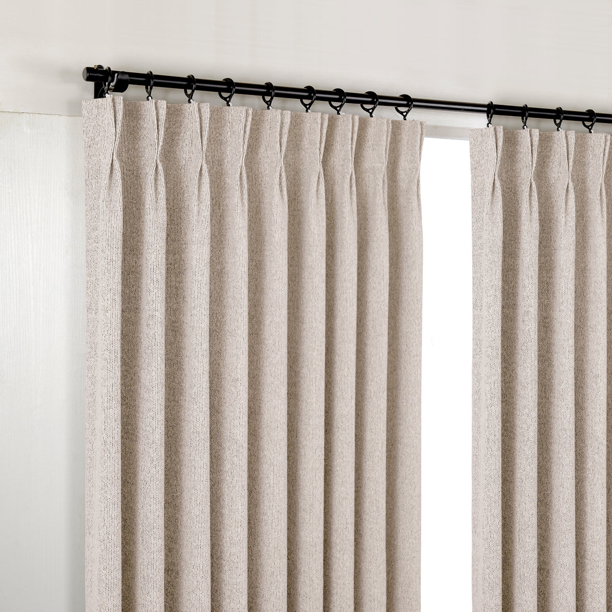 Pembroke Rib Weave Curtains in Pale Greige, hanging at the window