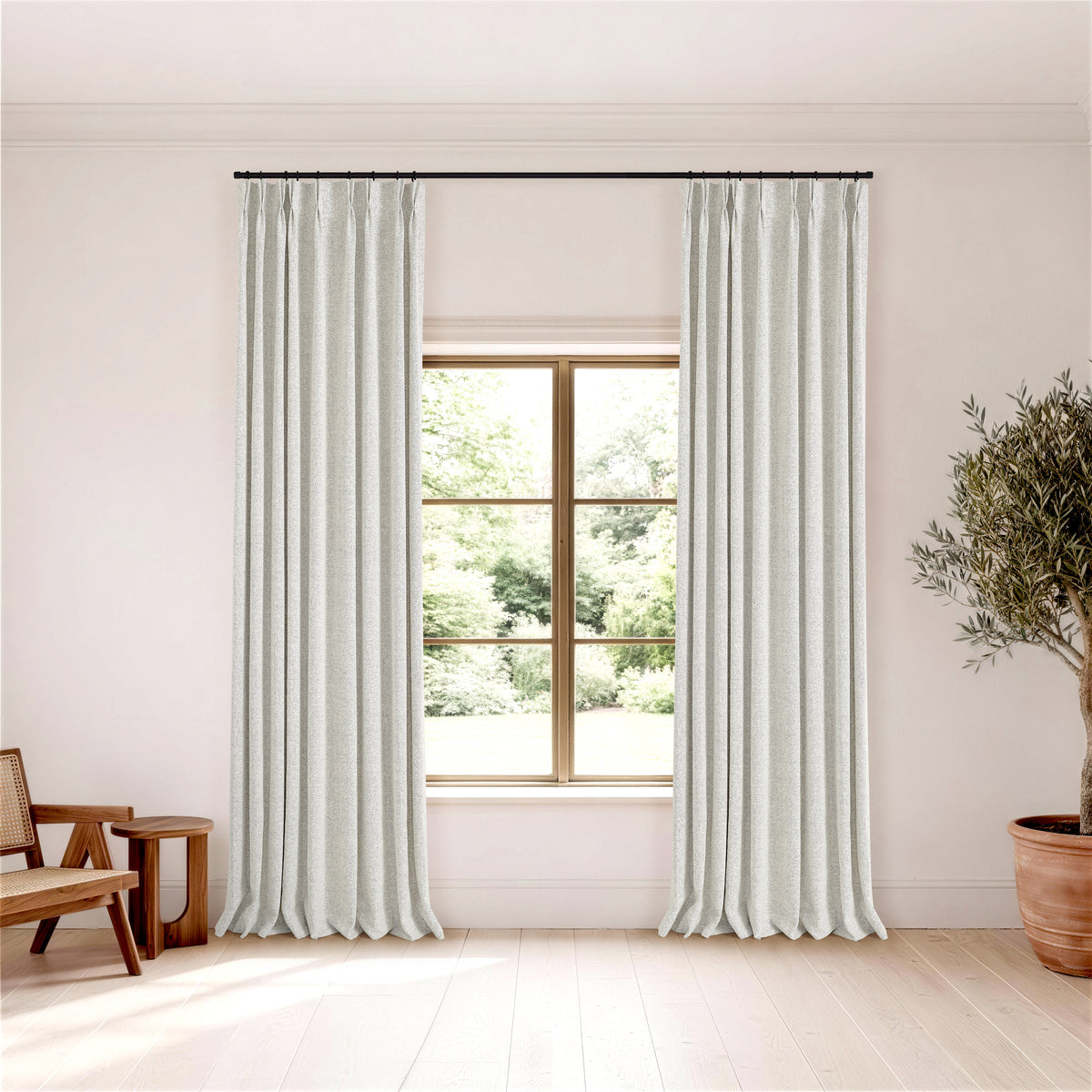 Pembroke Flecked Weave Curtains in Cool Chalk, hanging in a room