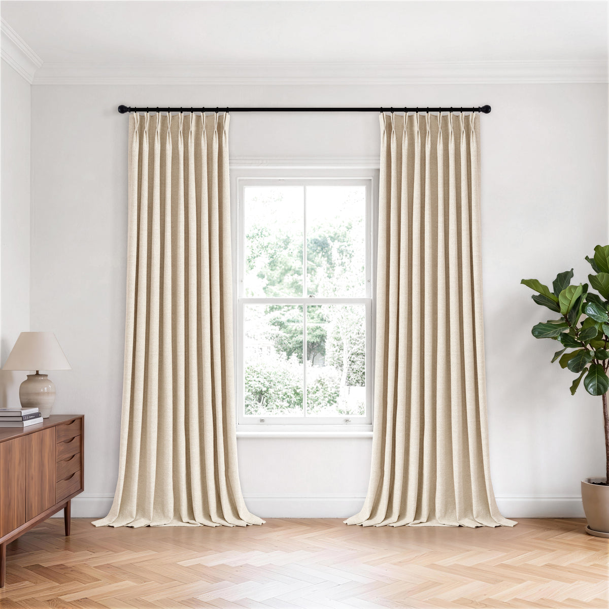 Pembroke Herringbone Weave Curtains in Sand, hanging in a room