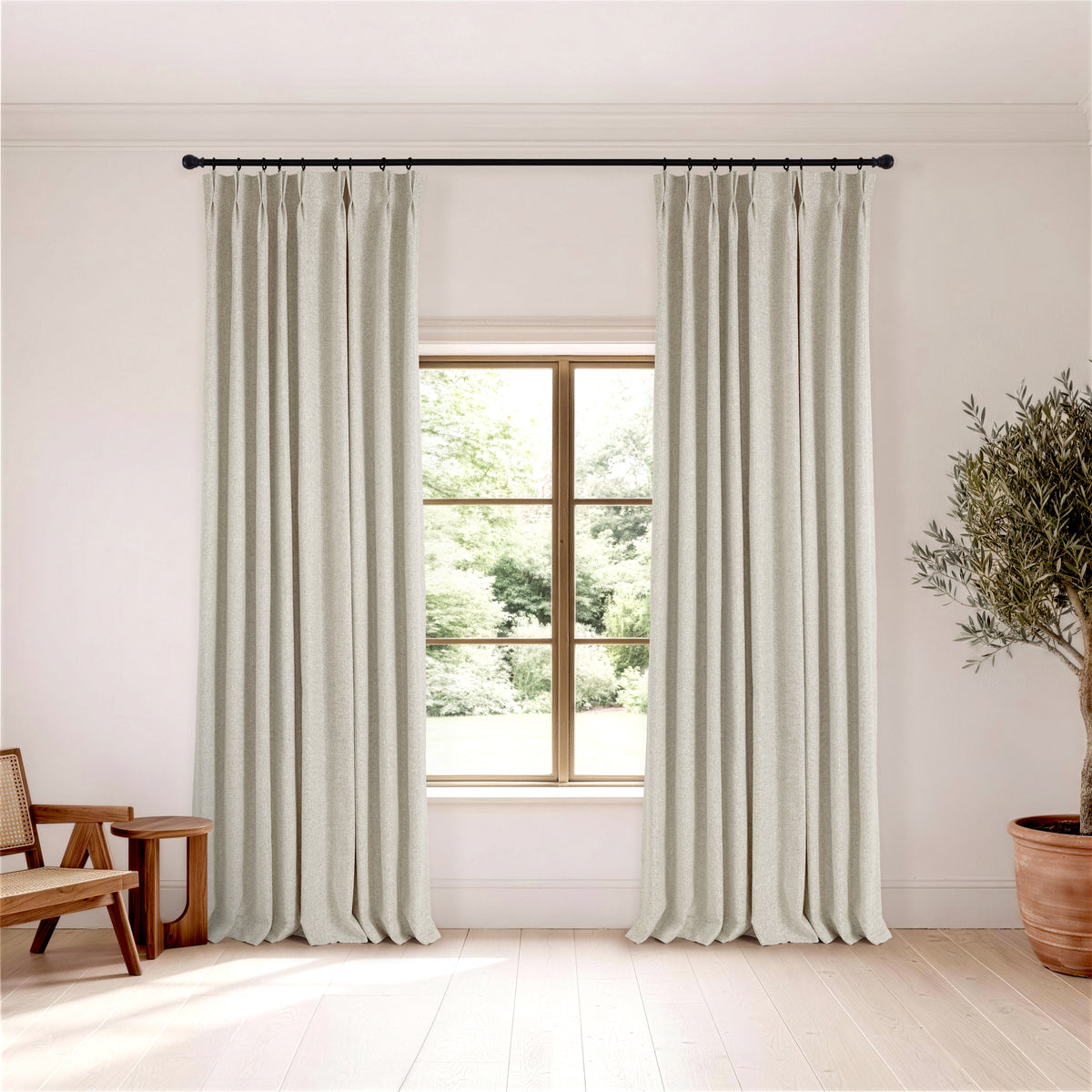 Pembroke Rib Weave Curtains in Oat, hanging in a room