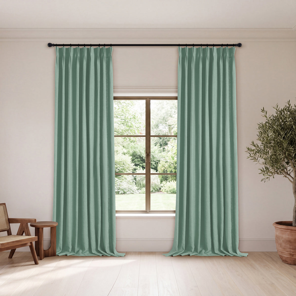Ainsley Pure Linen Curtains in Eucalyptus, hanging in a room