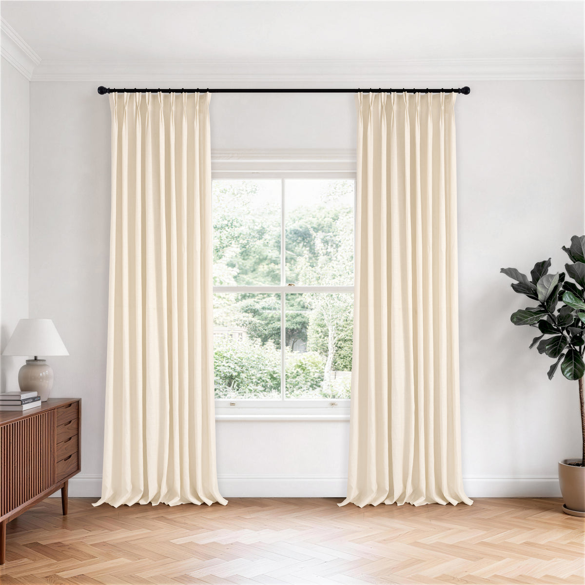 Rafe Slubbed Pure Linen Curtains in Cream, hanging in a room