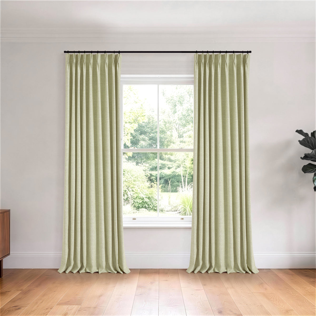 Pembroke Flecked Weave Curtains in Olive, hanging in a room