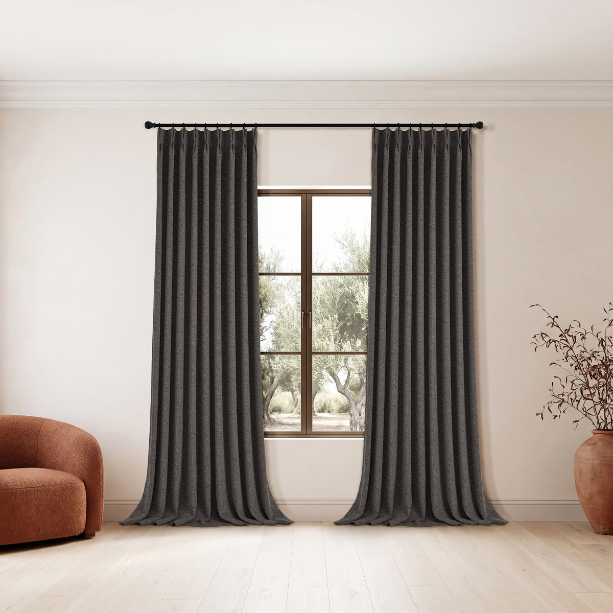 Everett Yarn-Dyed Jacquard Blackout Curtains in Ink, hanging in a room