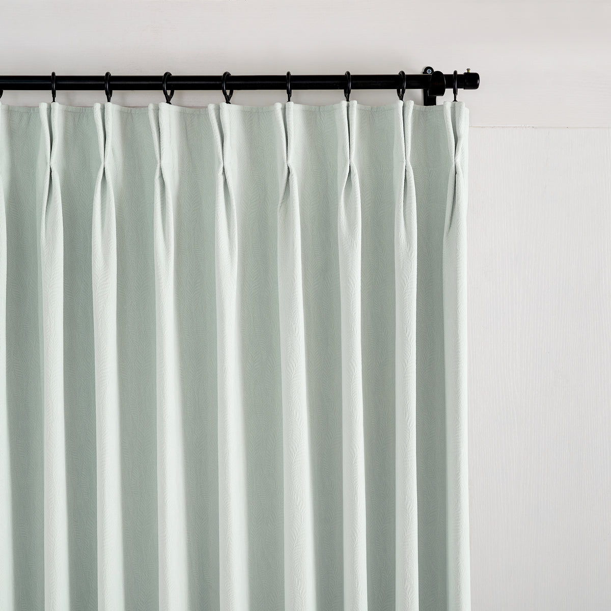 Cordelia Sculpted Chenille Blackout Curtains in Seafoam, pleated header close up