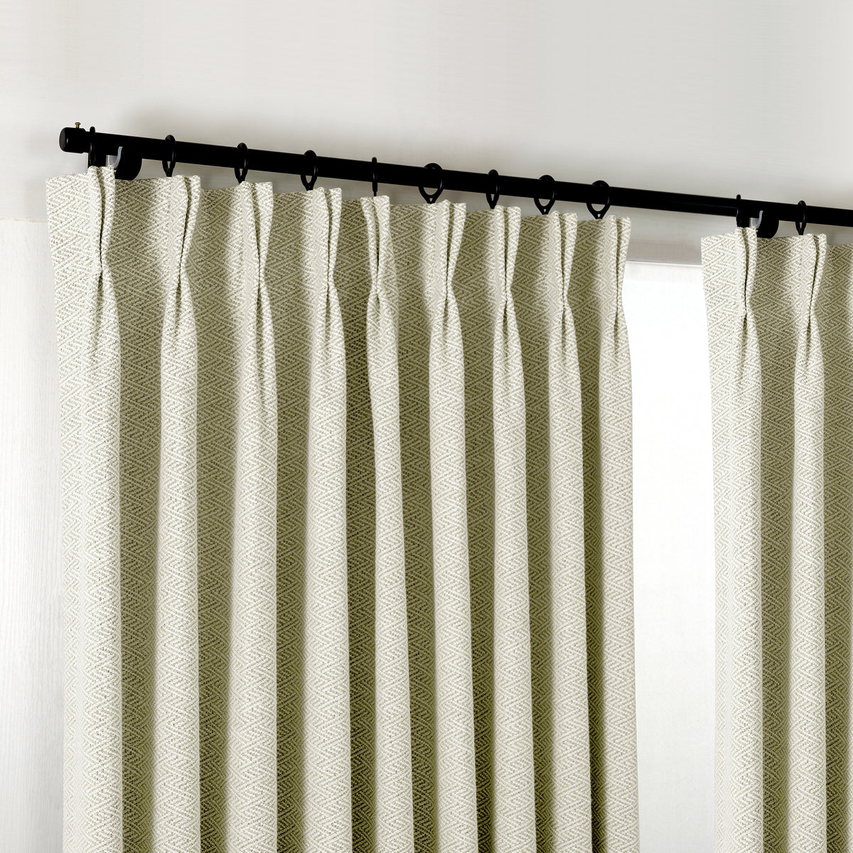 Pembroke Chevron Weave Curtains in Greige, hanging at the window