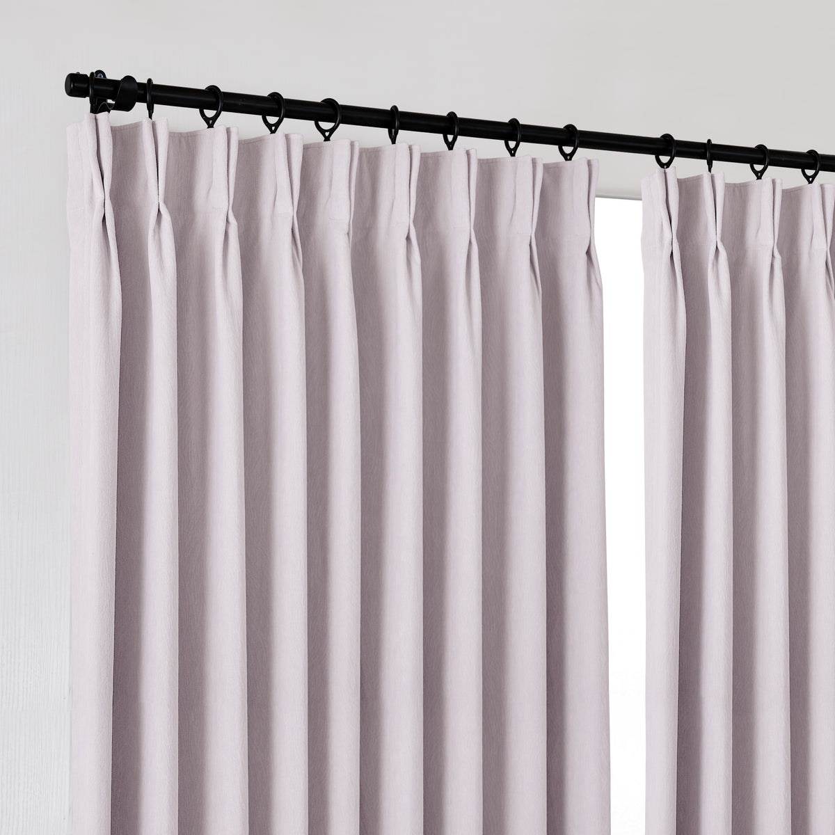 Ottilie Plush Chenille Blackout Curtains in Lilac, hanging at the window