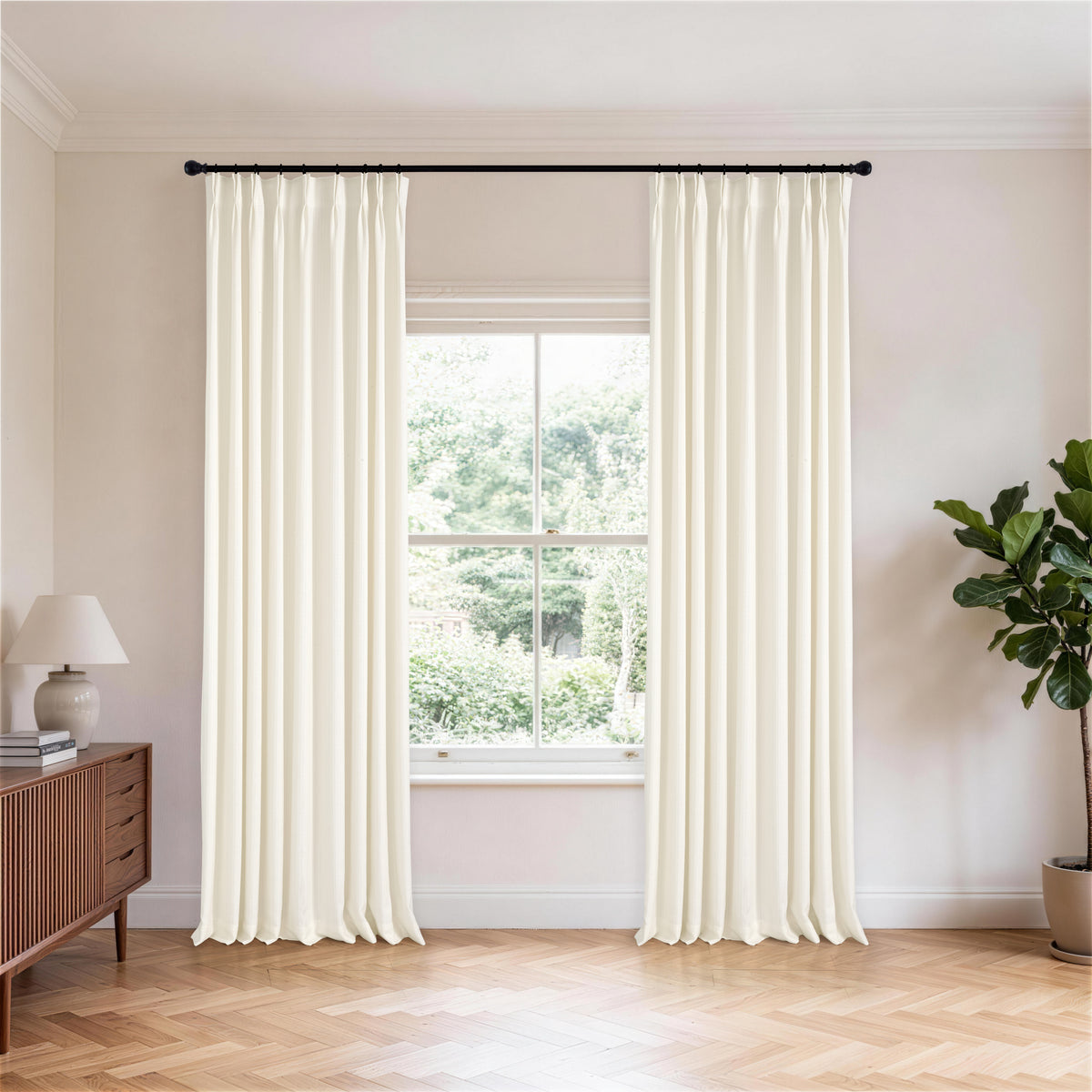 Ansel Slub Weave Curtains in Chalk, hanging in a room
