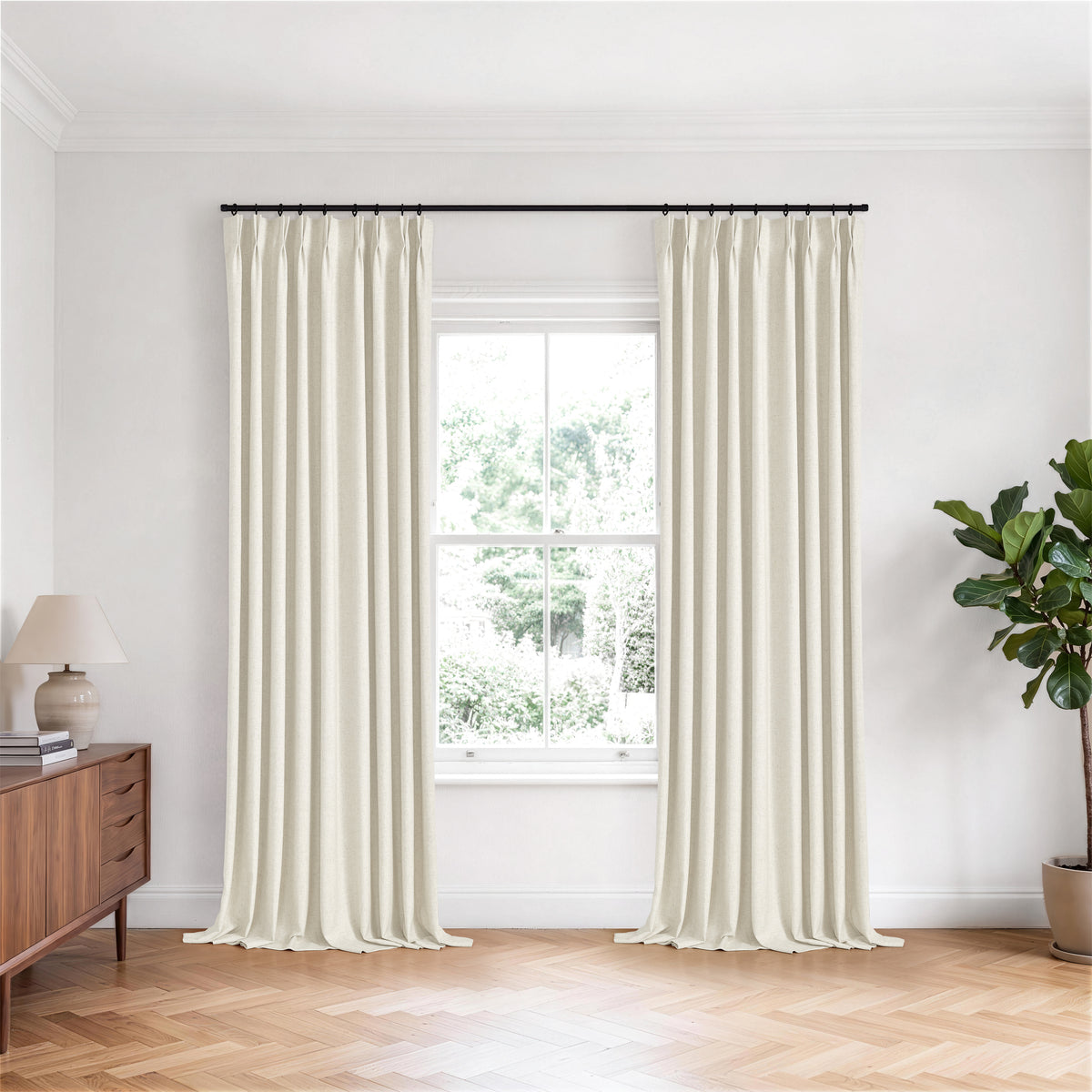Forrester Linen-Blend Slub Curtains in Ivory, hanging in a room