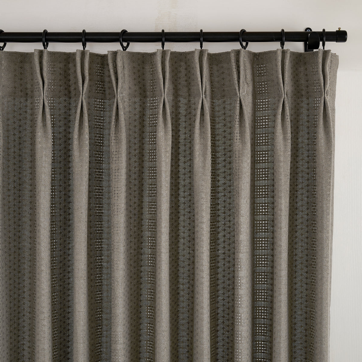 Ansel Eyelet Weave Curtains in Charcoal, pleated header close up