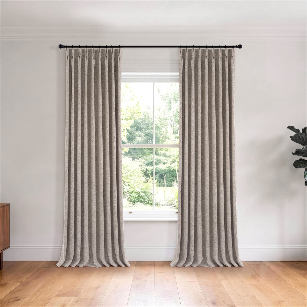 Bramwell Leaf Jacquard Blackout Curtains in Mauve, hanging in a room